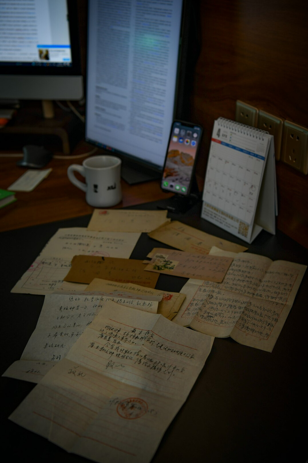 writer at desk with notes